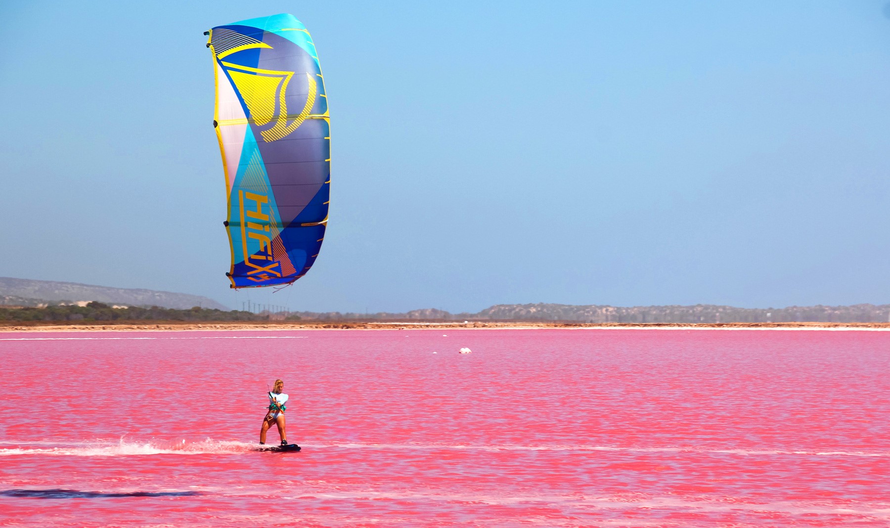 Kiteboarding-on-a-Bright-Pink-Lagoon-Kea-Janssen-2